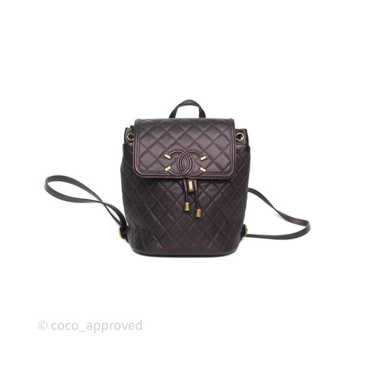 Chanel Quilted Filigree Backpack Iridescent Burgundy Caviar Aged Gold Hardware