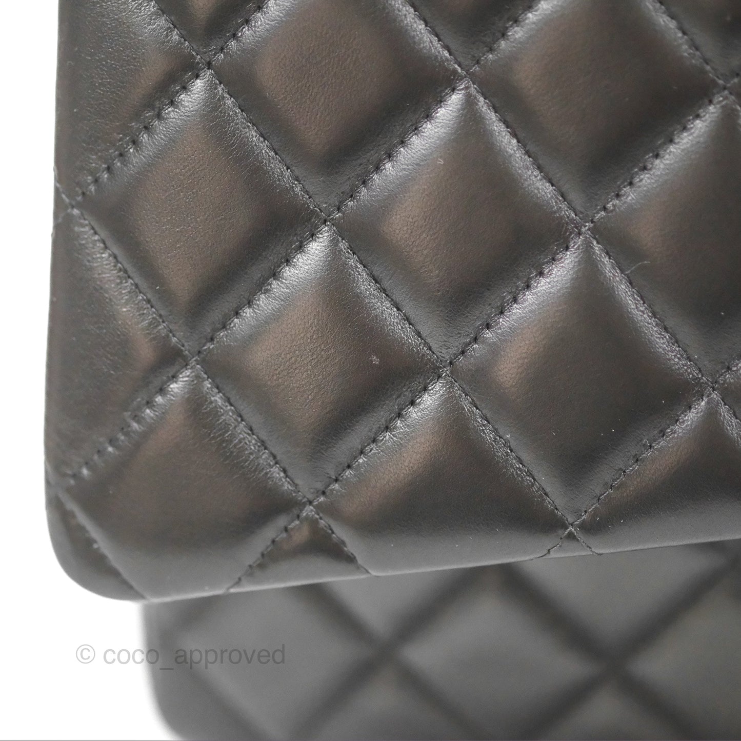 Chanel Quilted Maxi Double Flap Black Lambskin Silver Hardware