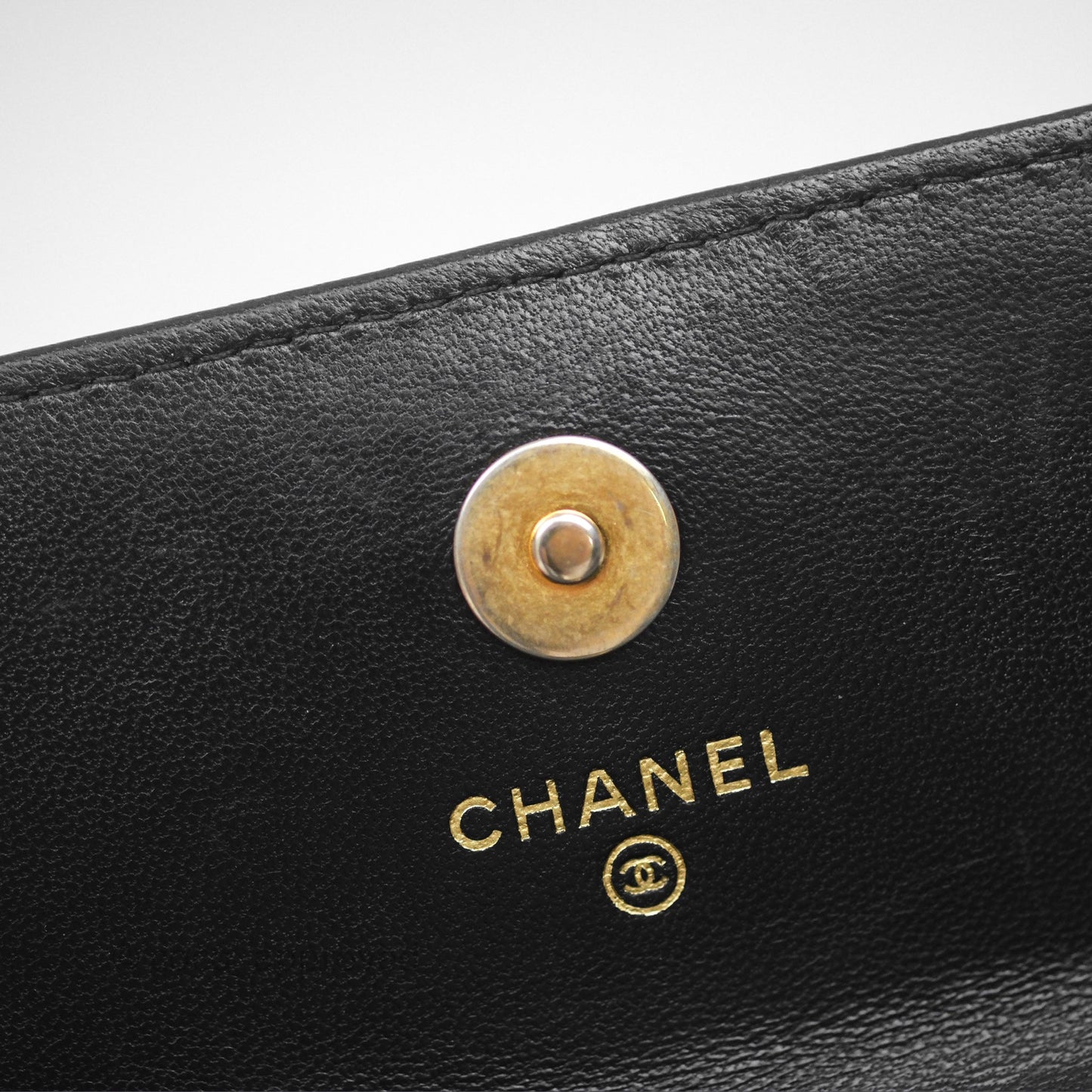 Chanel Mini Clutch With Chain Camellia Adjustable Black Lambskin Aged Gold Hardware