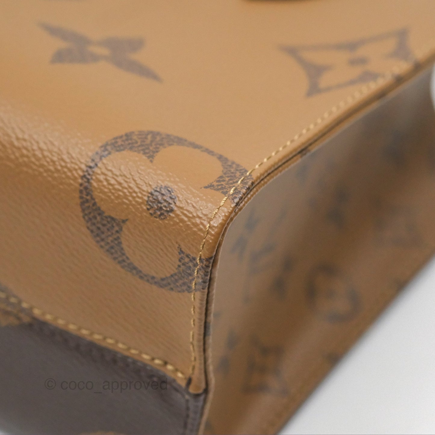 Louis Vuitton OnTheGo PM in Monogram Reverse Canvas