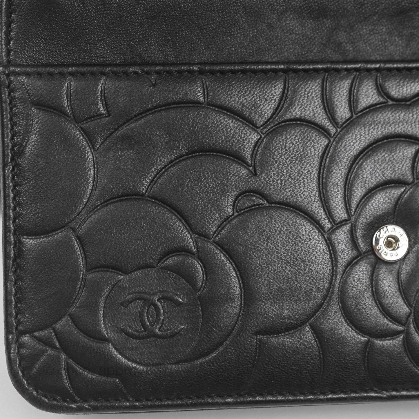 Chanel Camellia Embossed Wallet on Chain WOC Black Lambskin Silver Hardware