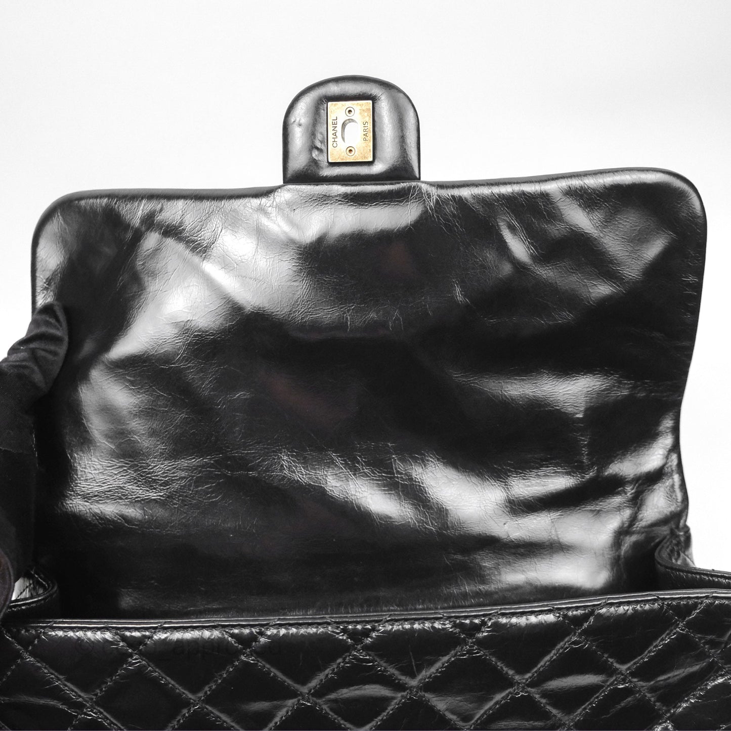 Chanel Medium Castle Rock Flap Black Glazed Calfskin Antique Gold Hardware