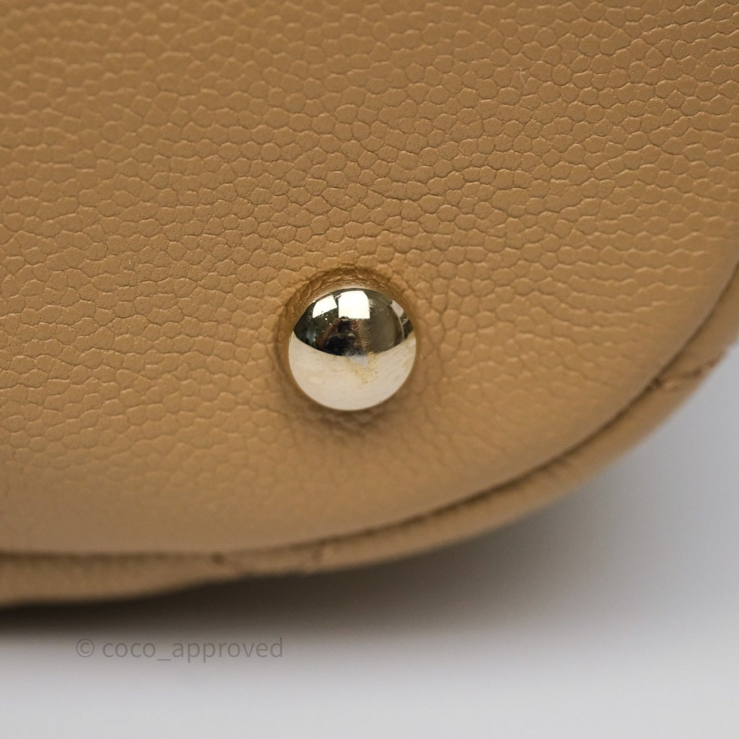 Chanel Rolled Up Bucket Drawstring Bag Beige Caviar Gold Hardware
