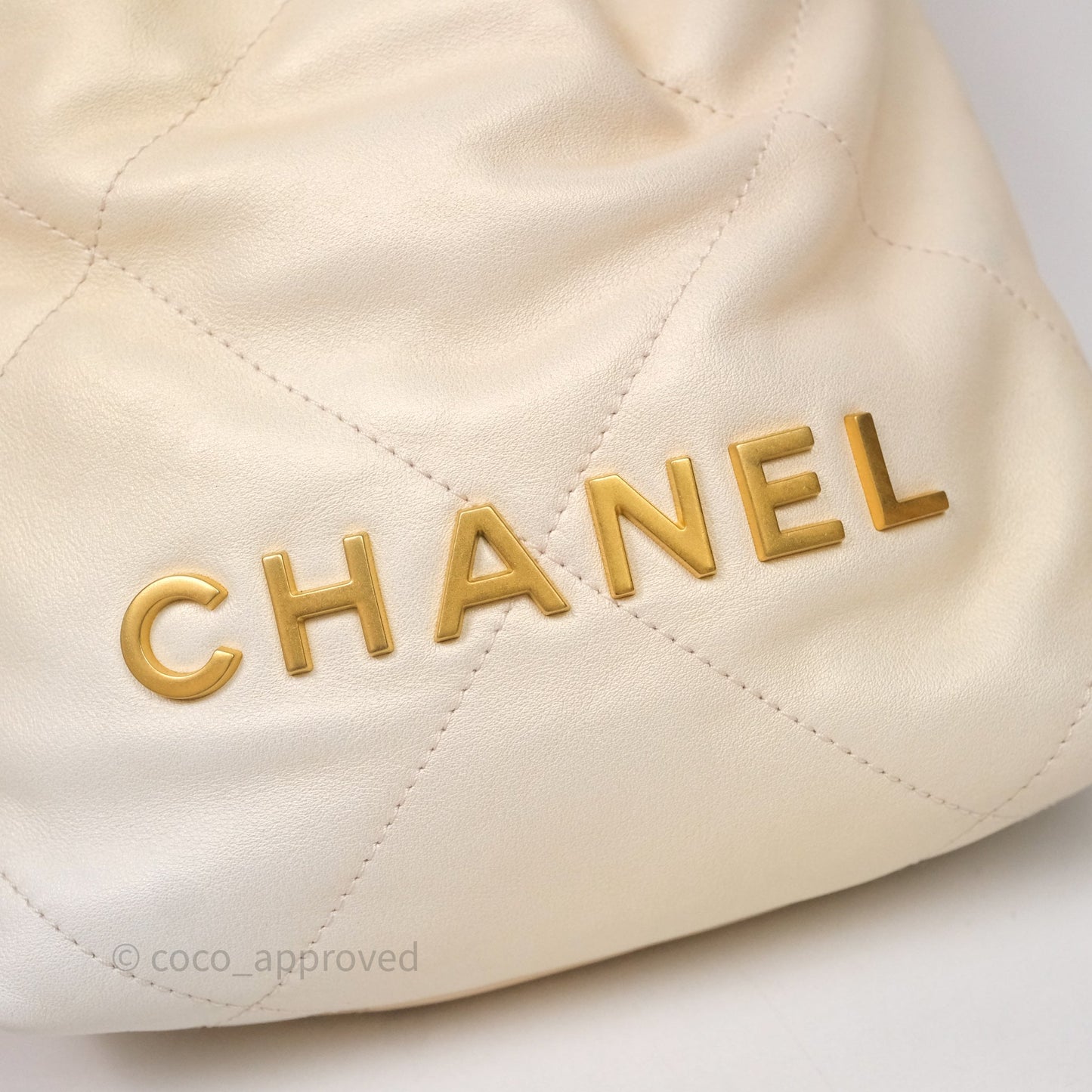 Chanel 22 Mini Bag Iridescent Light Pearly Calfskin Aged Gold Hardware