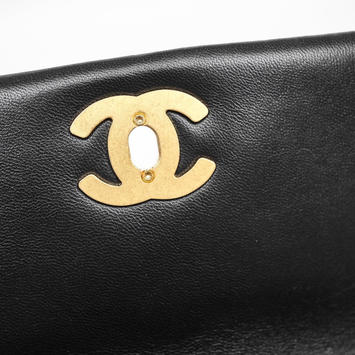 Chanel Quilted Accordion Flap Bag with Button on Chain Black Lambskin Aged Gold Hardware 22A