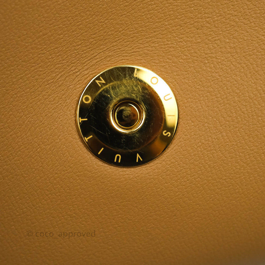 Louis Vuitton Pochette Coussin Monogram Caramel Beige Gold Hardware