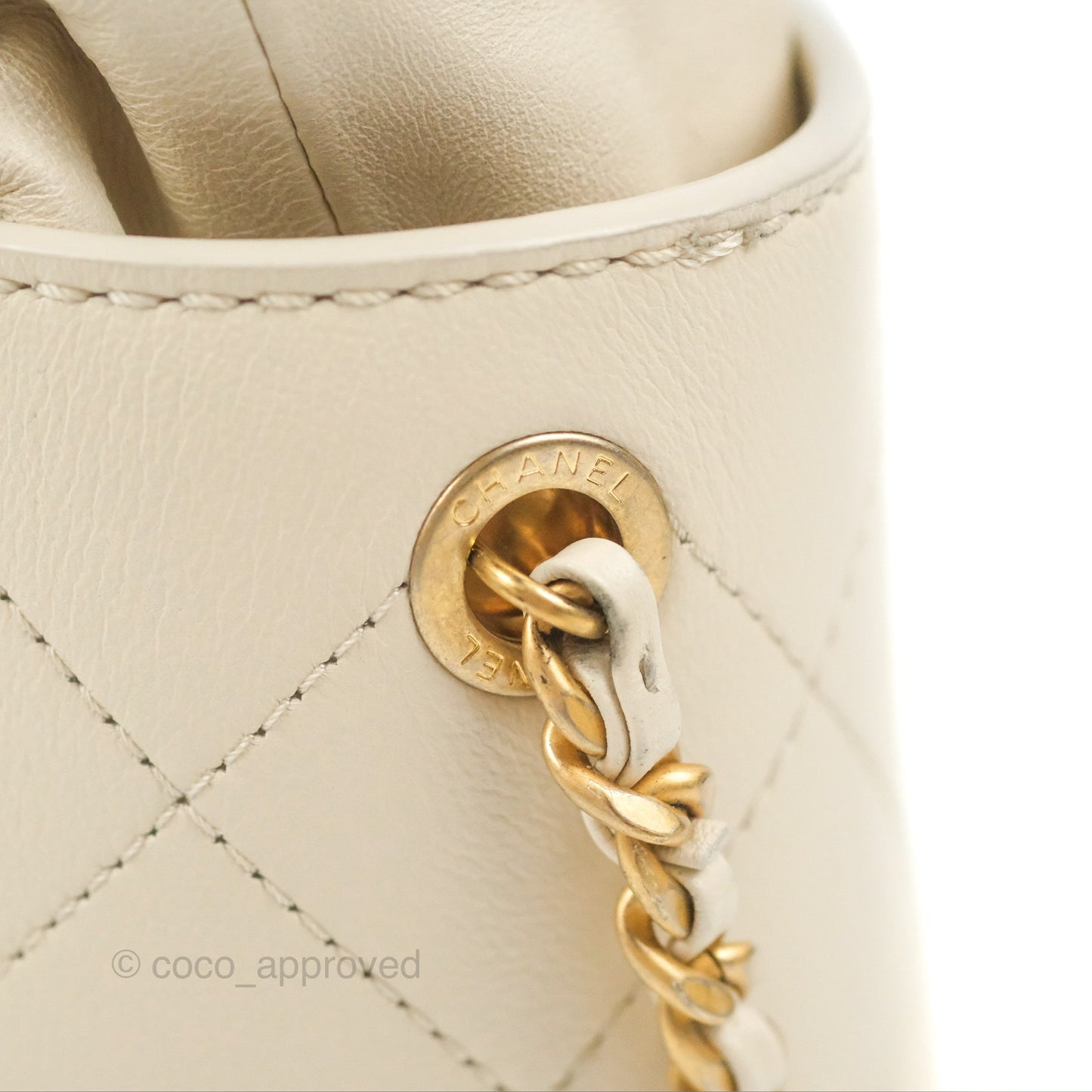 Chanel Quilted Drawstring Bucket Bag Ivory Lambskin Aged Gold Hardware 19C
