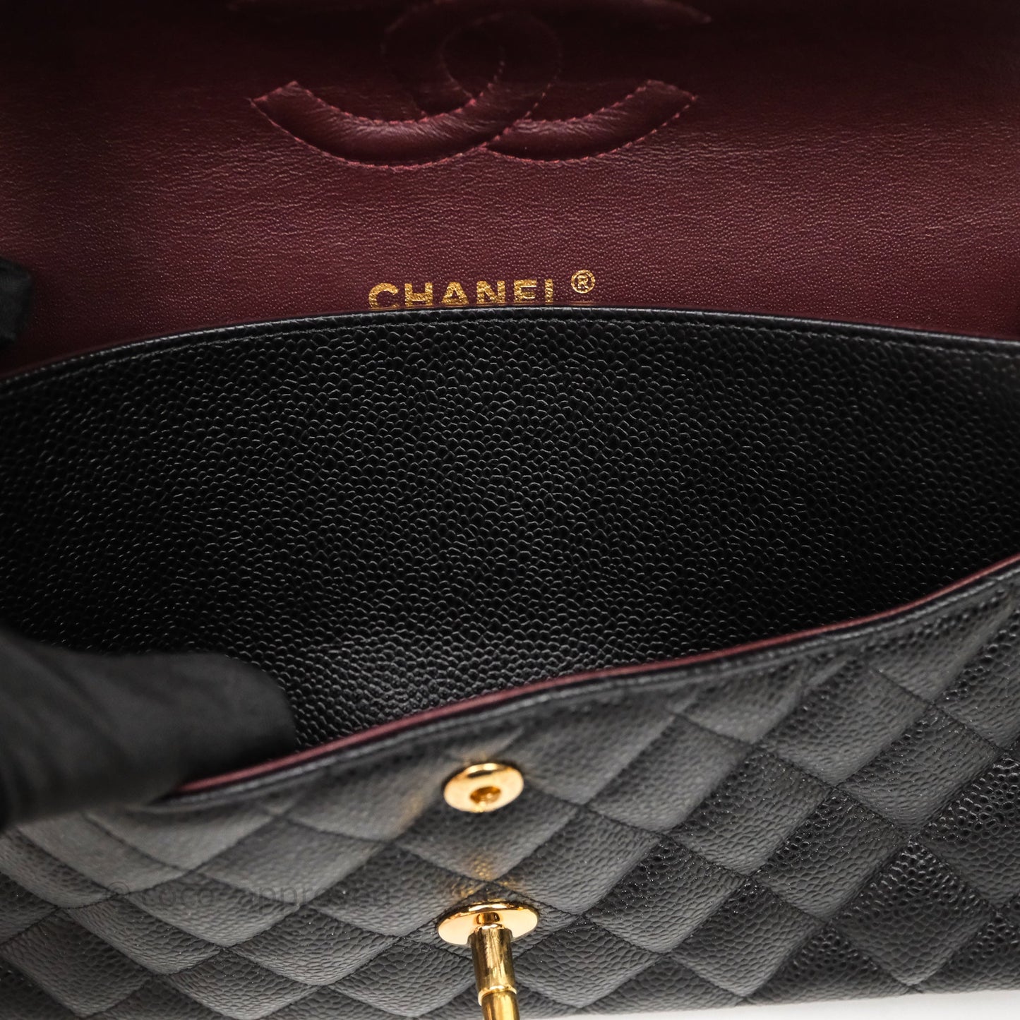 Chanel Medium Classic Flap Quilted Black Caviar Gold Hardware