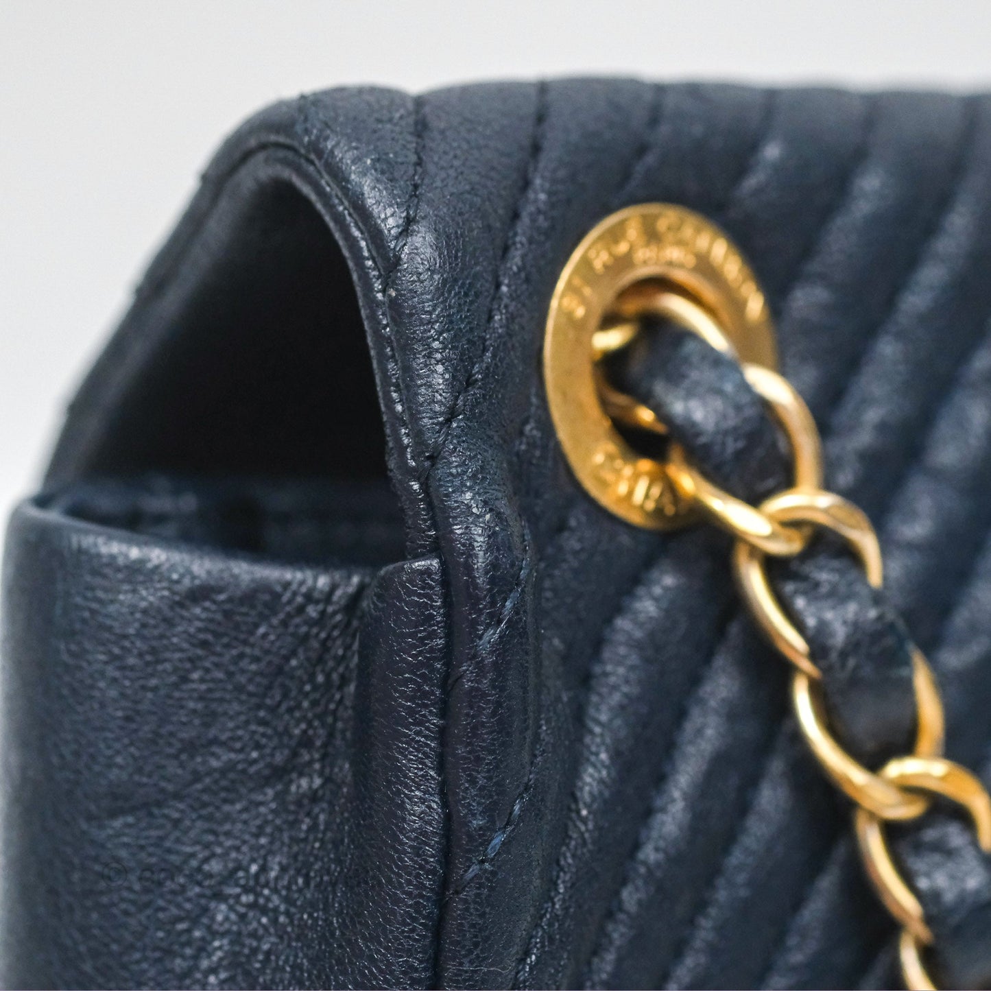Chanel Small Chevron Surpique Flap Navy Calfskin Aged Gold Hardware