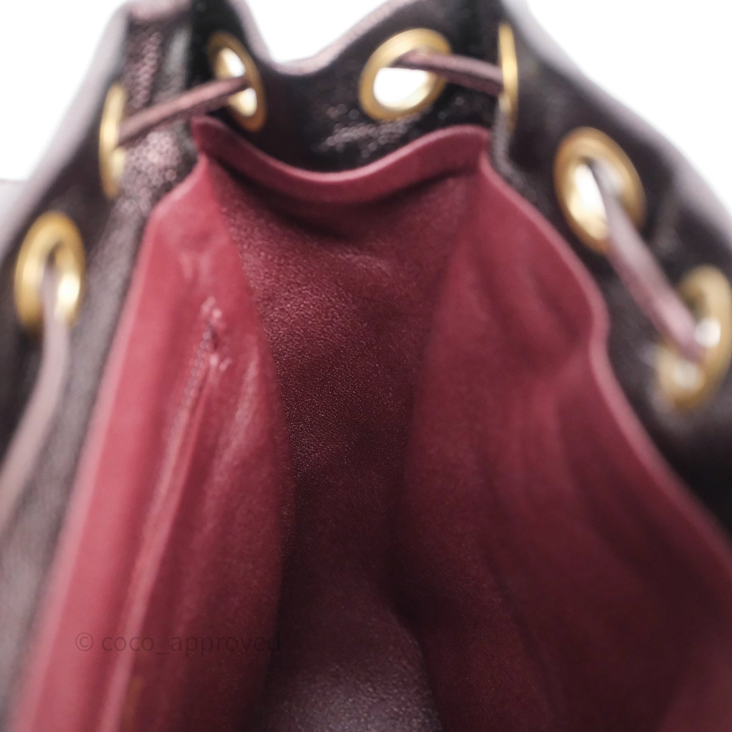 Chanel Quilted Filigree Backpack Iridescent Burgundy Caviar Aged Gold Hardware