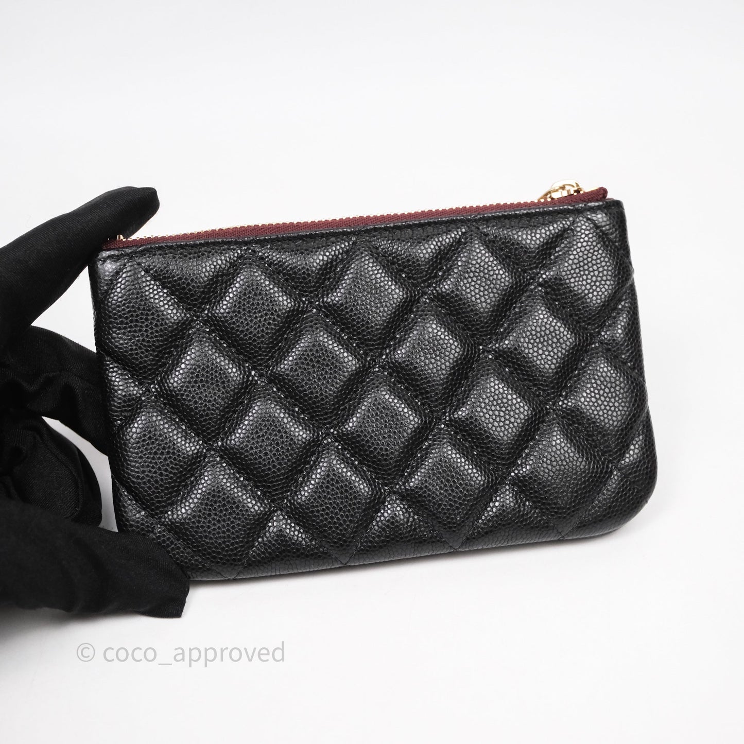 Chanel Quilted Mini O case Black Caviar Gold Hardware