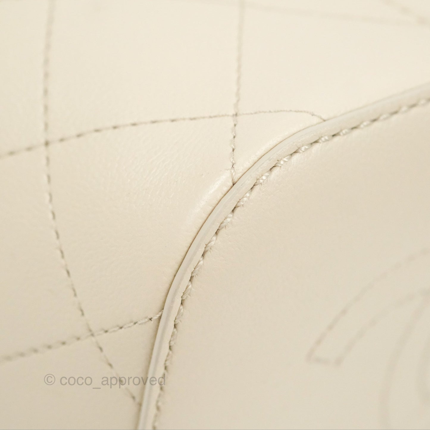 Chanel Quilted Drawstring Bucket Bag Ivory Lambskin Aged Gold Hardware 19C