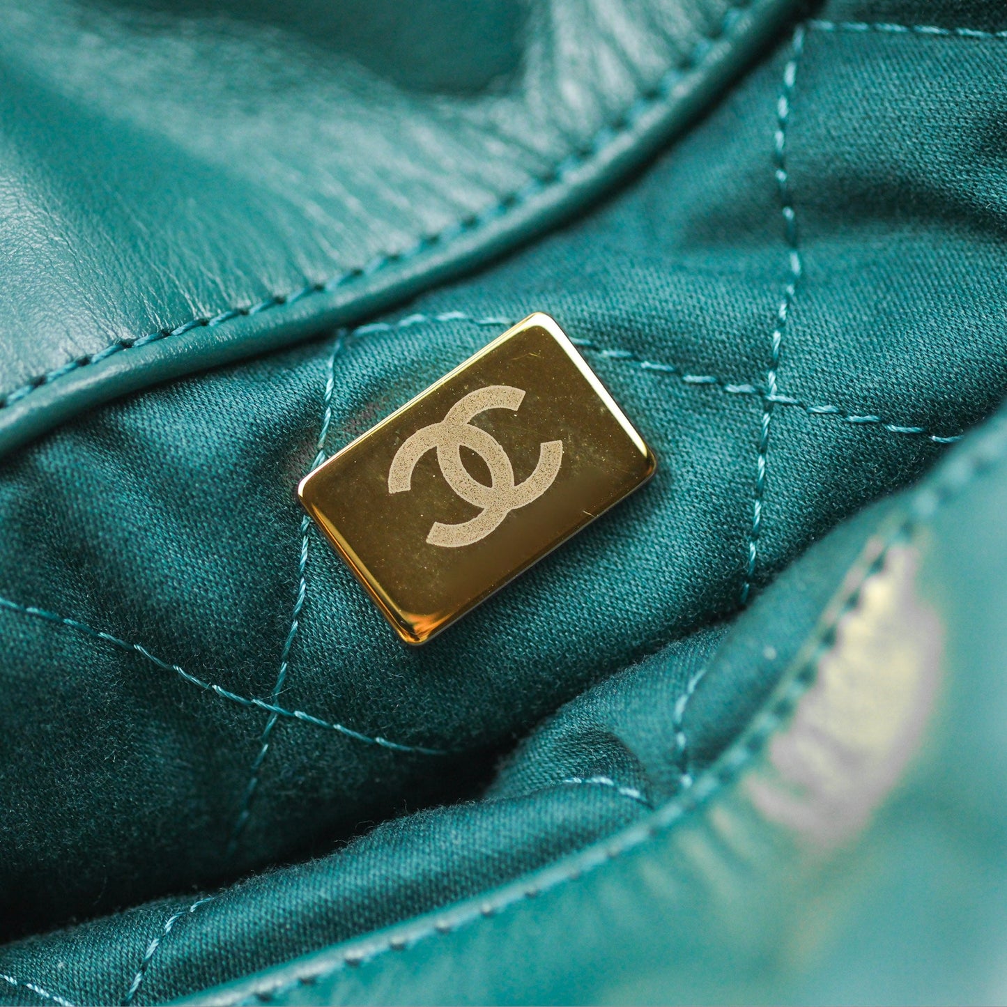 Chanel 22 Small Quilted Backpack Green Shiny Calfskin