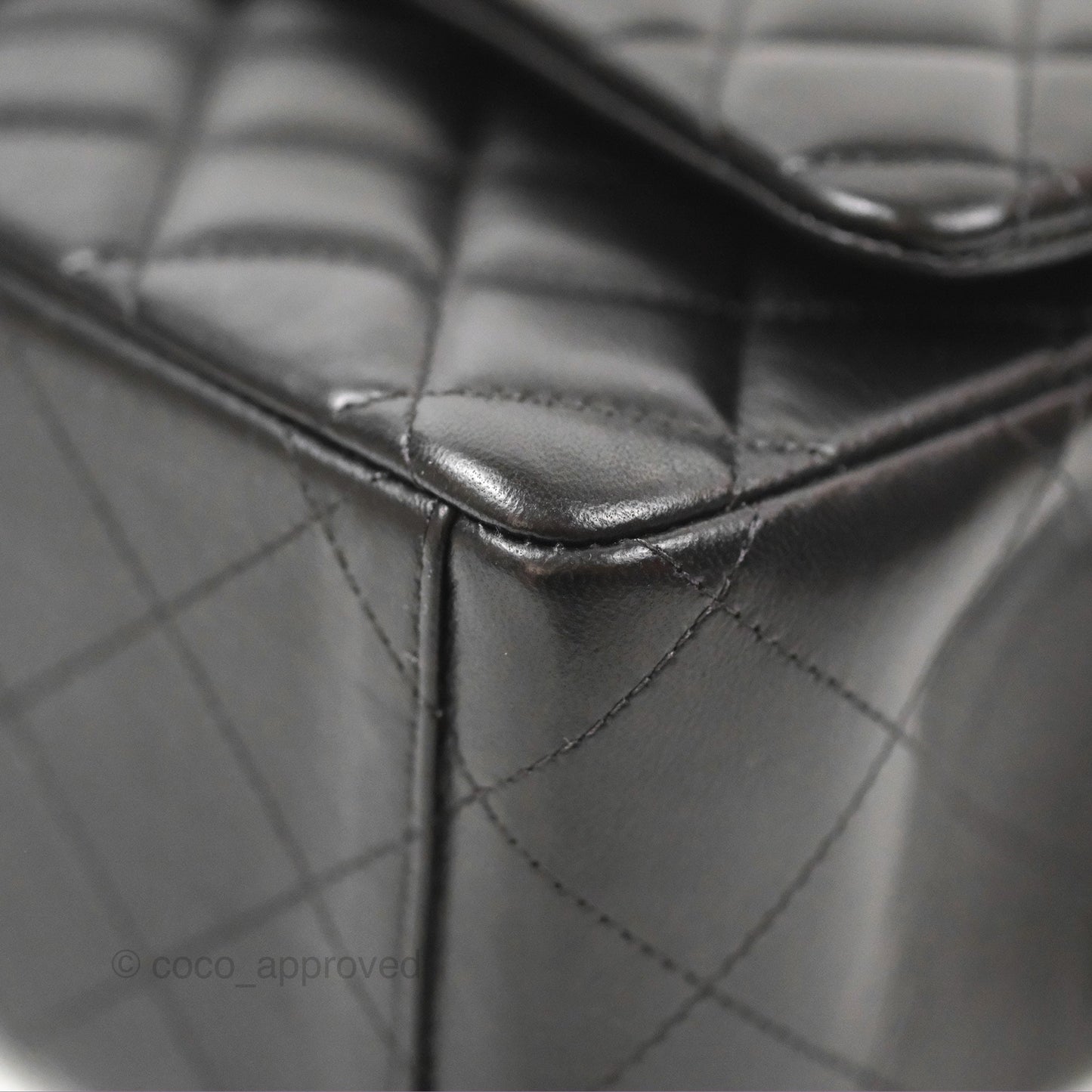 Chanel Quilted Maxi Double Flap Black Lambskin Silver Hardware