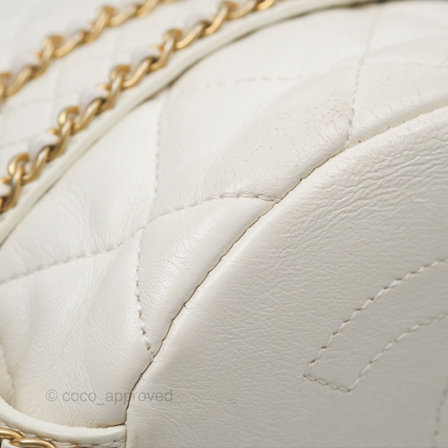 Chanel Quilted Drawstring Bucket Bag Ivory Lambskin Aged Gold Hardware