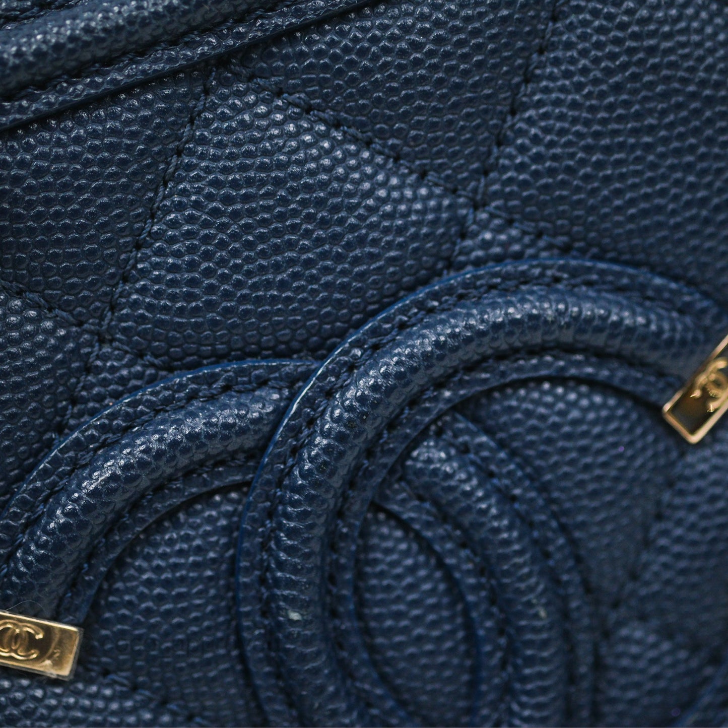 Chanel Quilted Small CC Filigree Vanity Case Navy Caviar Gold Hardware