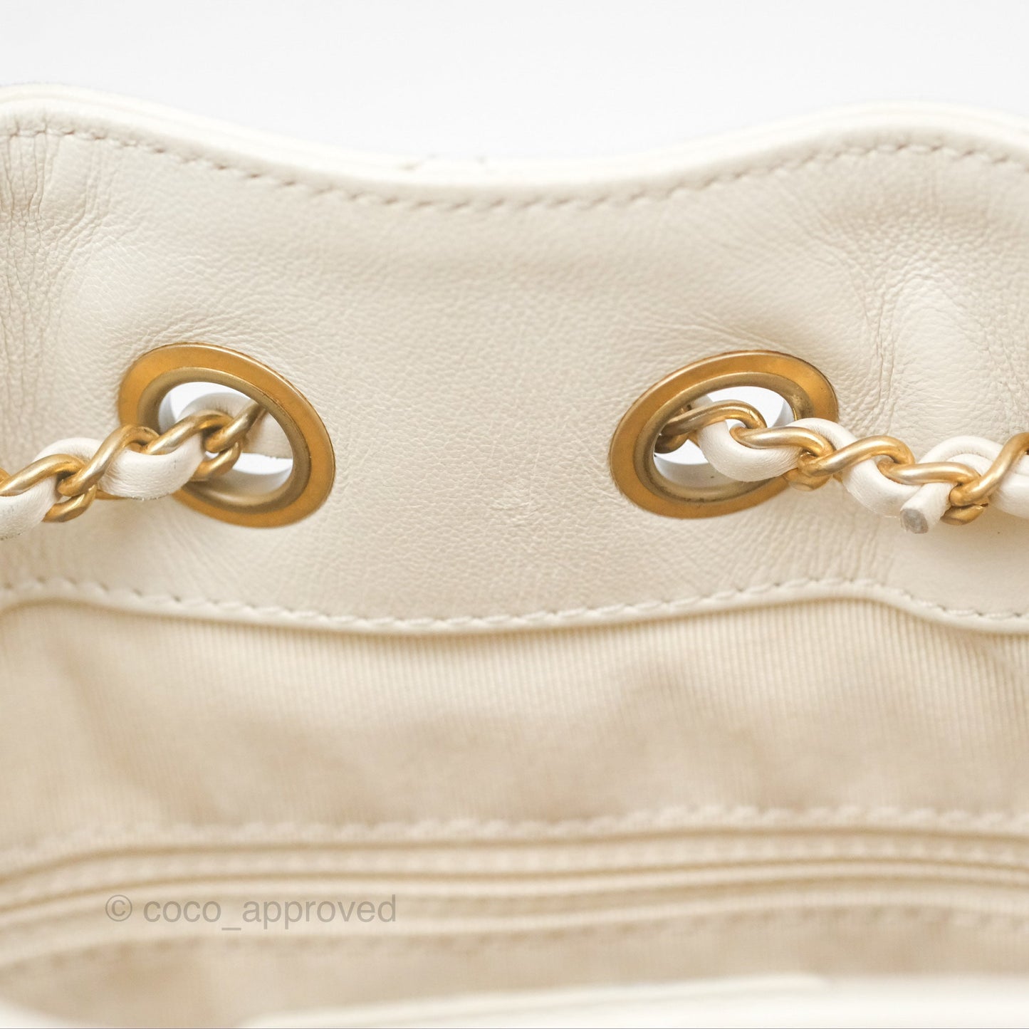 Chanel Quilted Drawstring Bucket Bag Ivory Lambskin Aged Gold Hardware