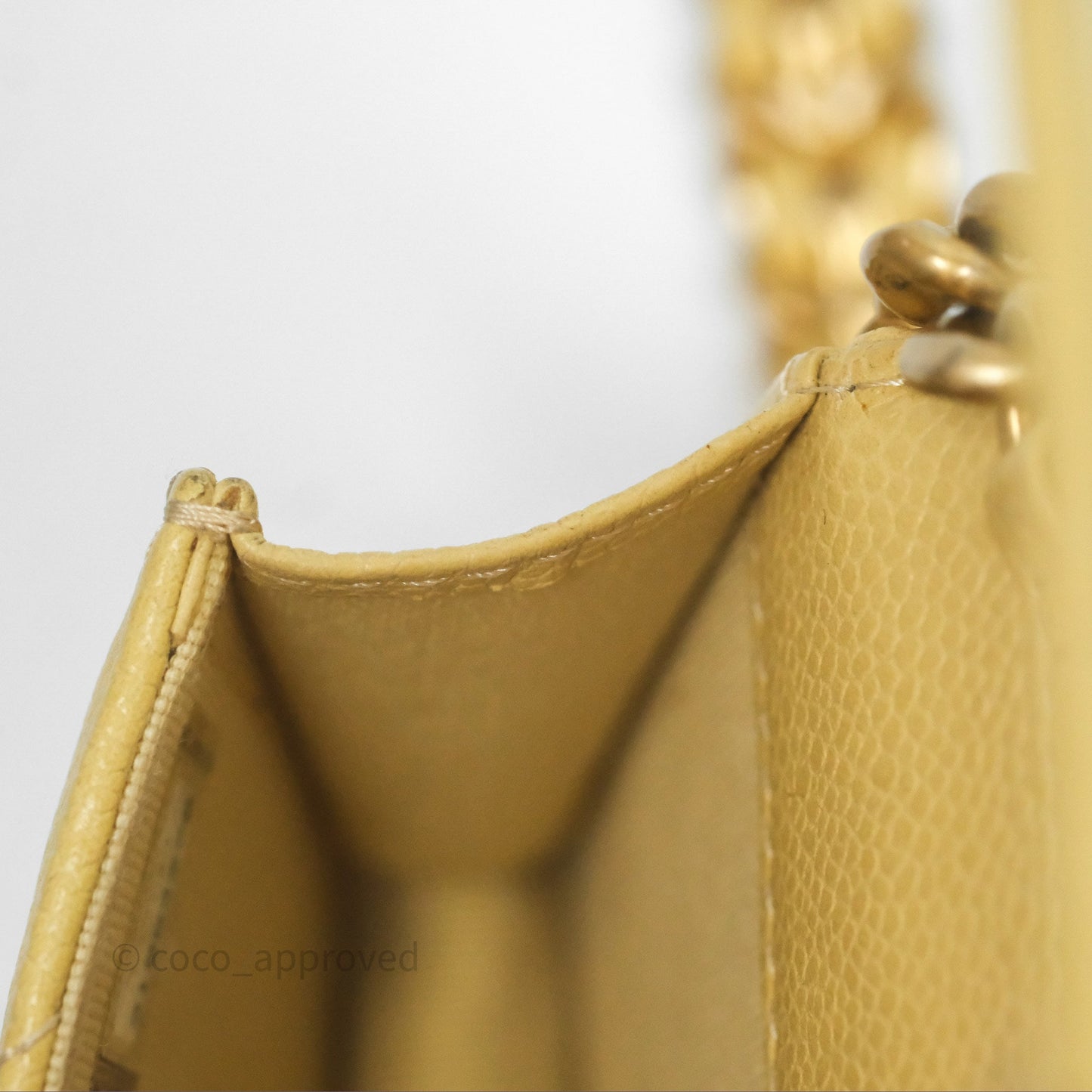Chanel Mini Clutch With Chain Yellow Caviar Aged Gold Hardware