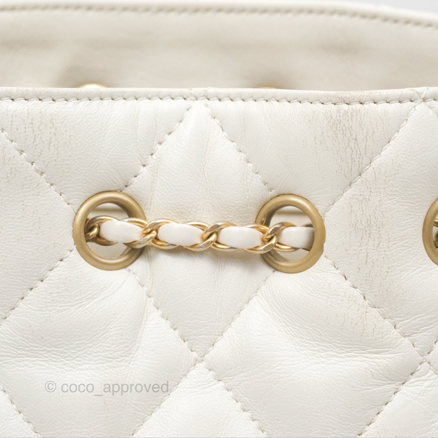 Chanel Quilted Drawstring Bucket Bag Ivory Lambskin Aged Gold Hardware