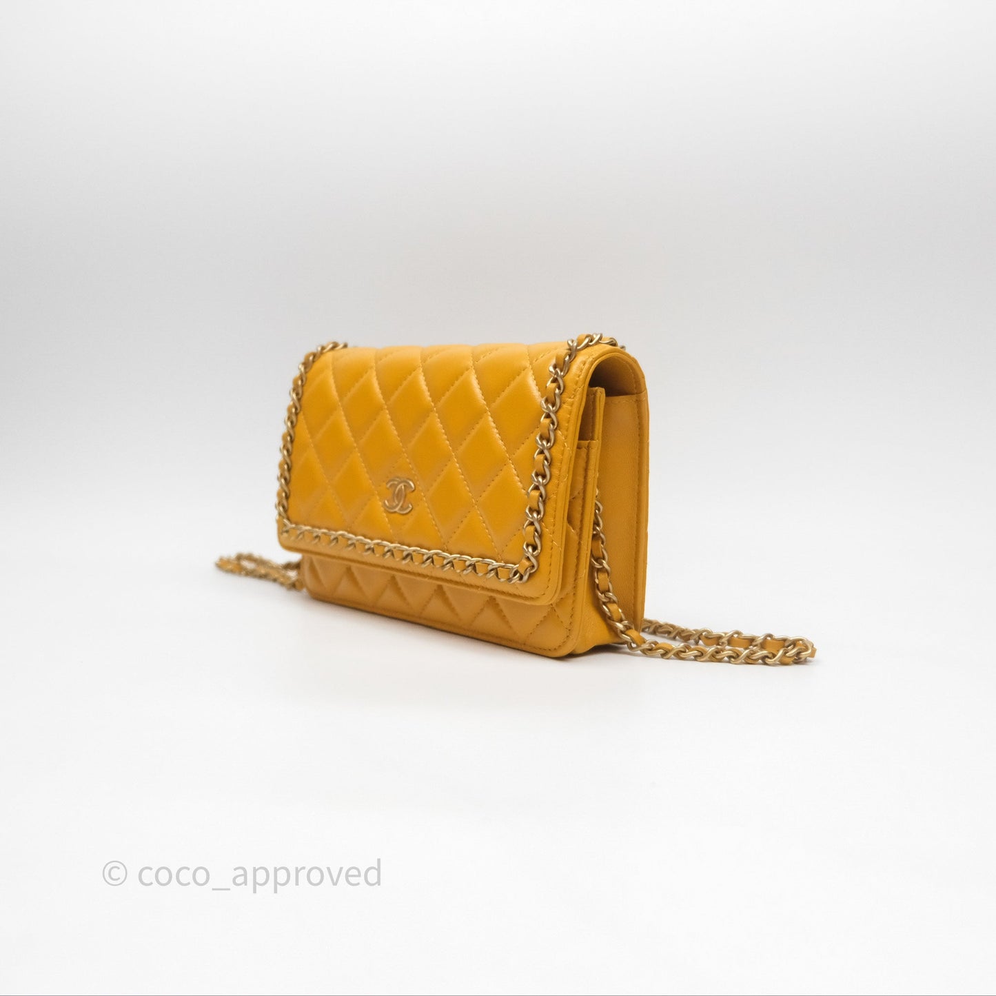 Chanel Quilted Classic Chain Around WOC Yellow Lambskin Aged Gold Hardware