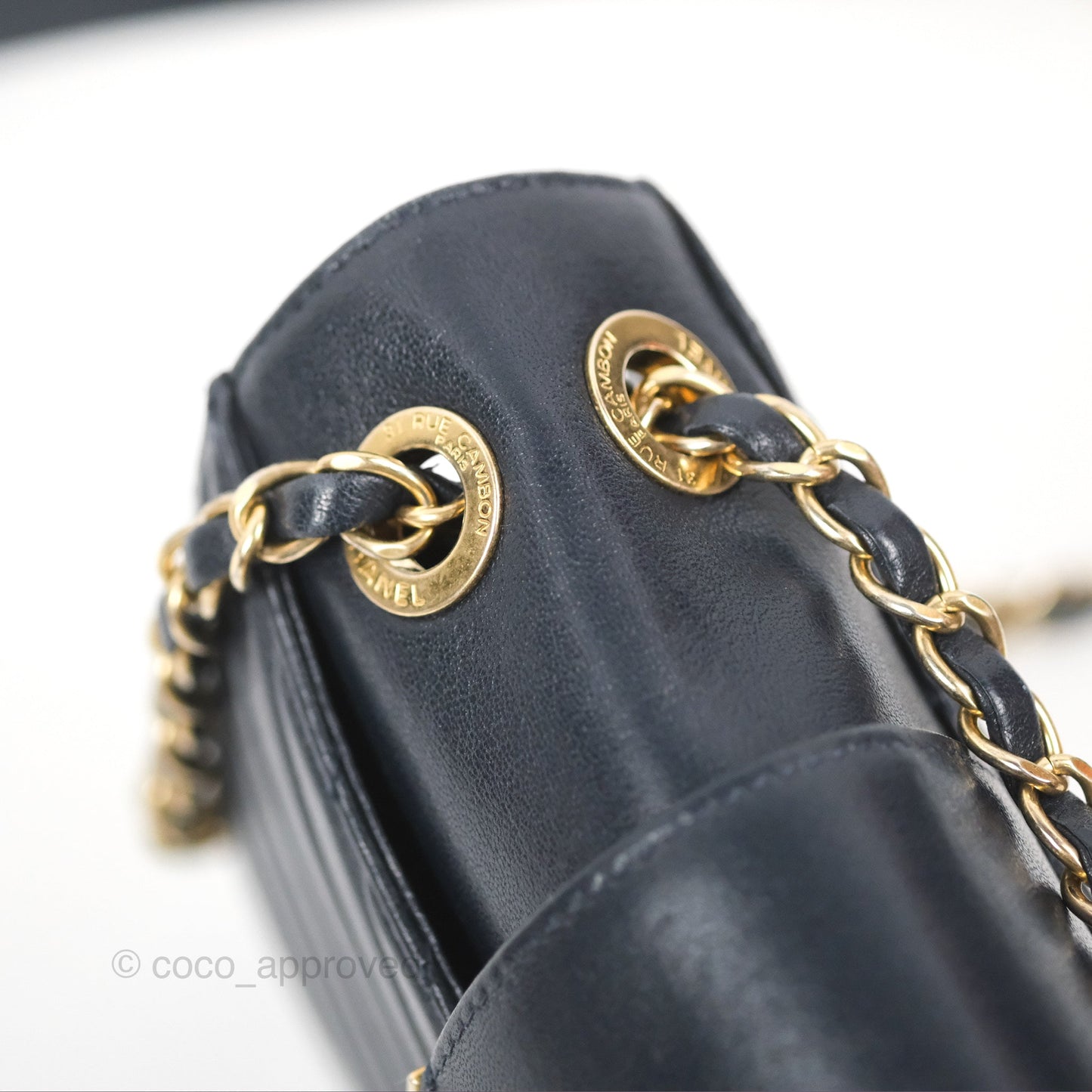Chanel Mini Collar and Tie Flap Bag Chevron Navy Sheepskin Aged Gold Hardware