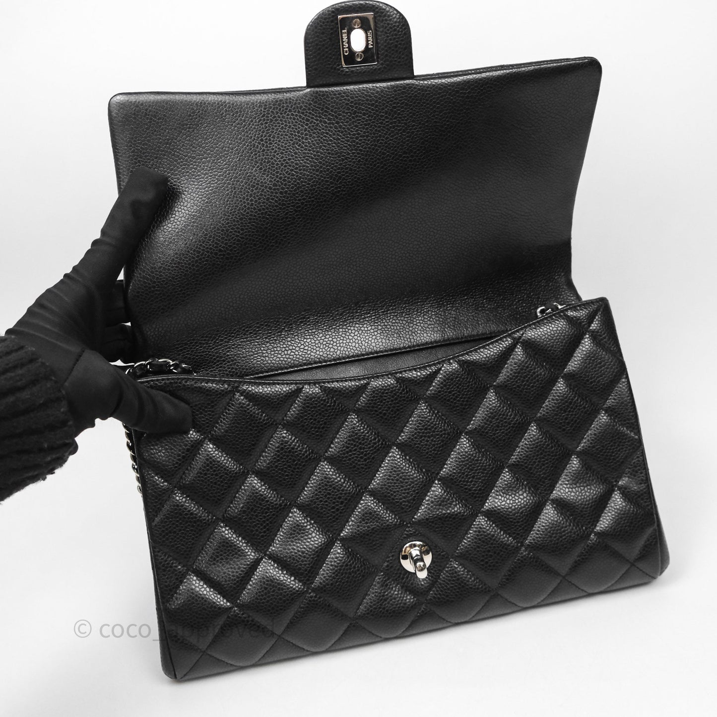 Chanel Quilted Clutch with Chain Black Caviar Silver Hardware