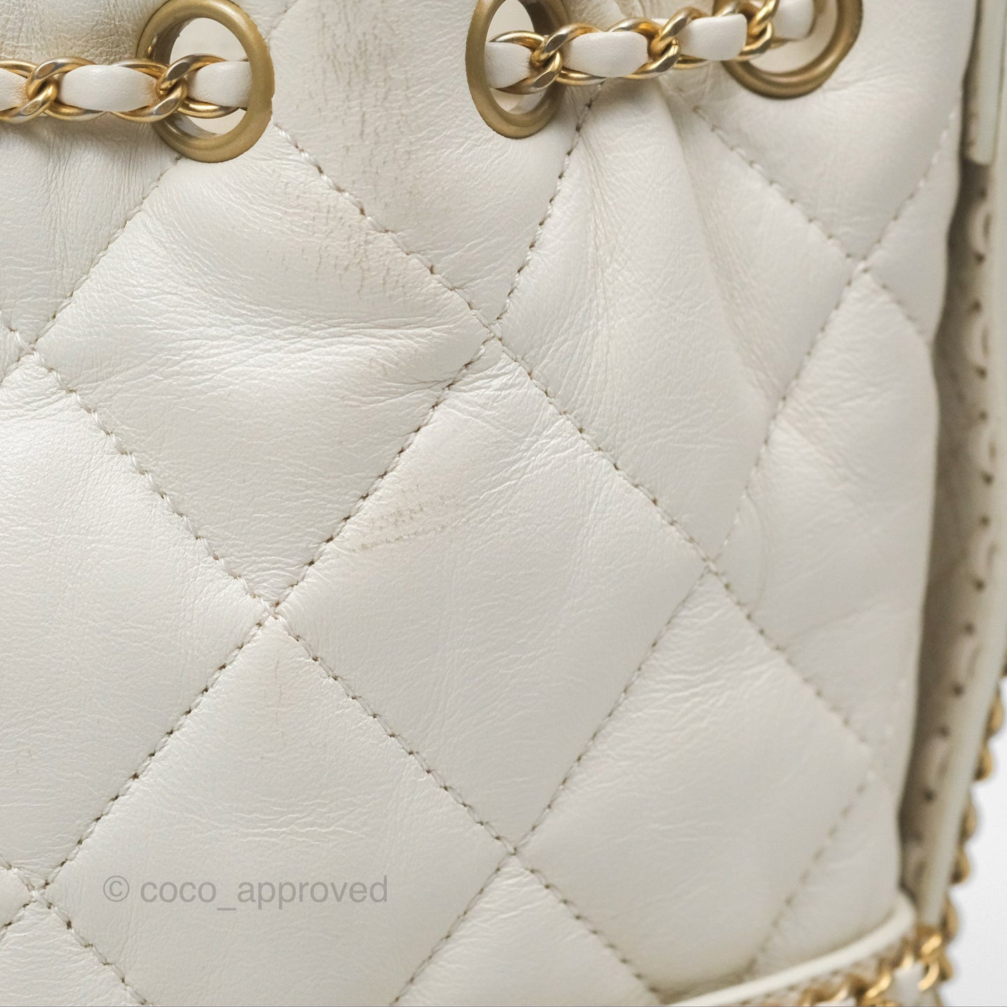 Chanel Quilted Drawstring Bucket Bag Ivory Lambskin Aged Gold Hardware