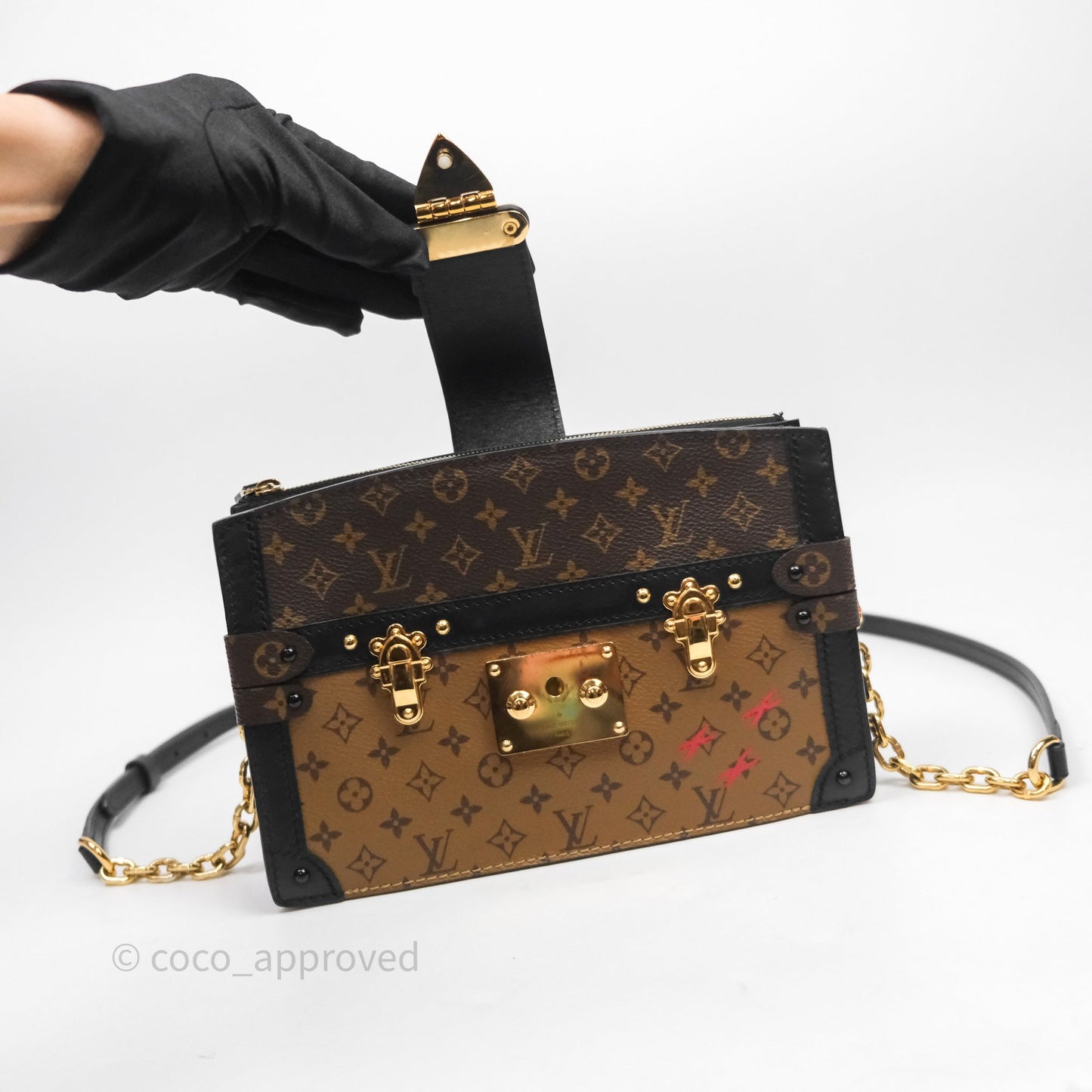 Louis Vuitton Monogram Reverse Trunk Clutch Bag