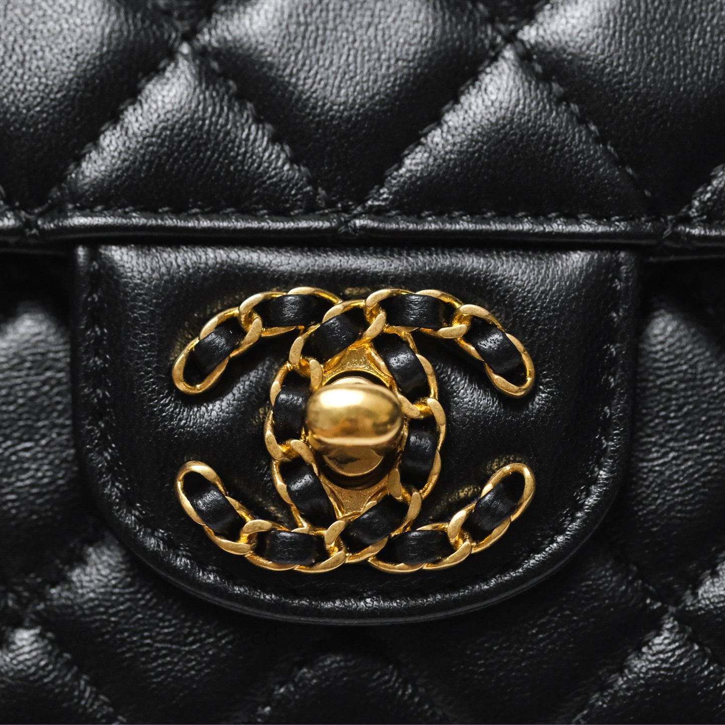 Chanel Flap Bag with Crystal Logo Top Handle Black Lambskin Aged Gold Hardware