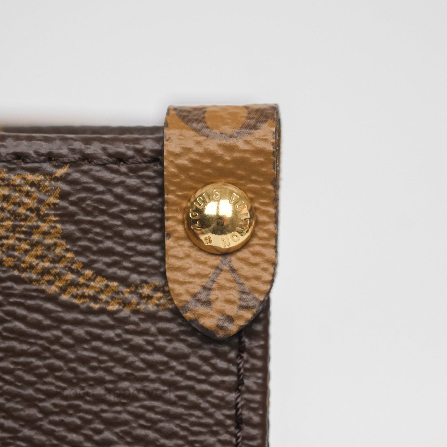 Louis Vuitton OnTheGo PM in Monogram Reverse Canvas