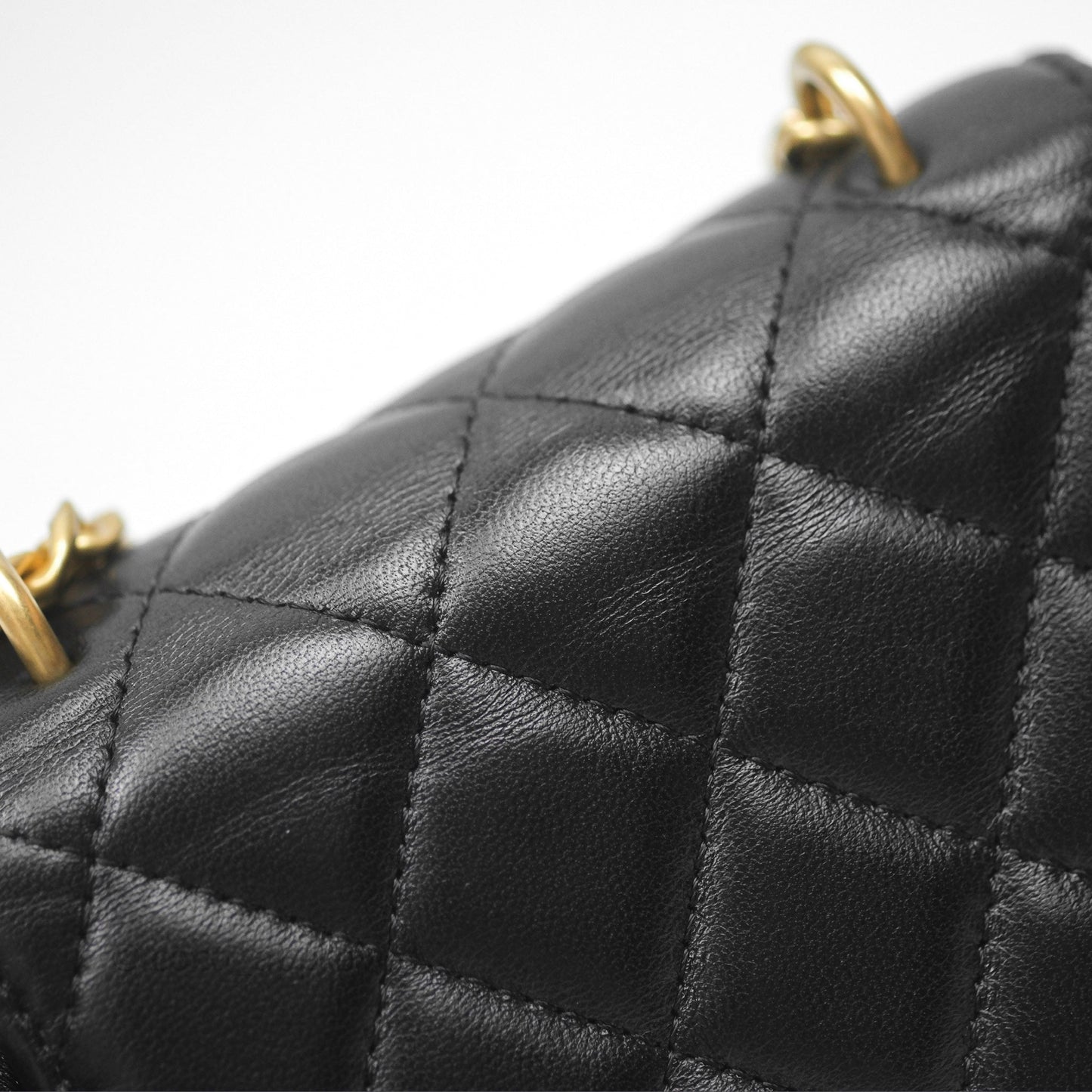 Chanel Mini Clutch With Chain Camellia Adjustable Black Lambskin Aged Gold Hardware