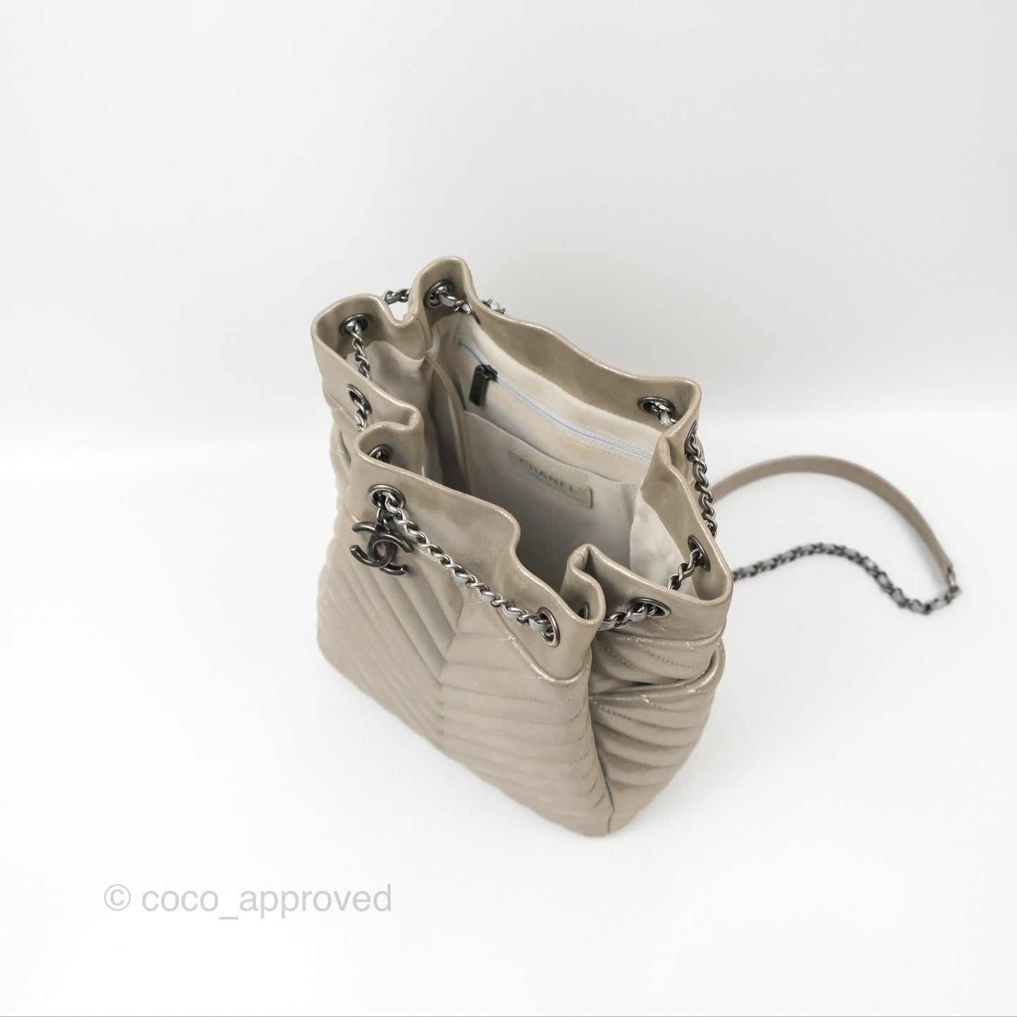 Chanel Small Urban Spirit Drawstring Bag Chevron Iridescent Silver Calfskin
