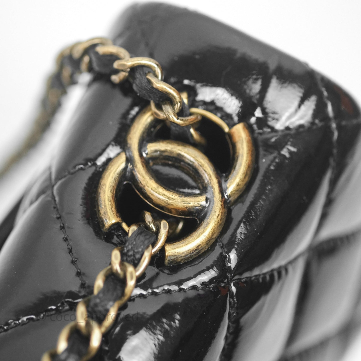 Chanel Quilted Medium Eyelet Flap Bag Black Patent Aged Gold Hardware