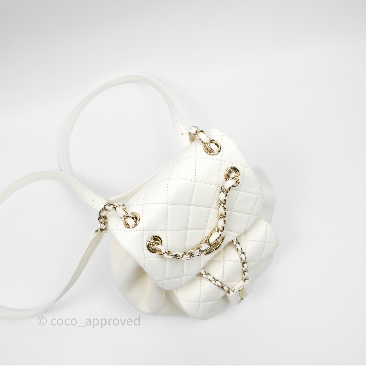 Chanel Quilted Small Duma Drawstring Backpack White Calfskin Gold Hardware