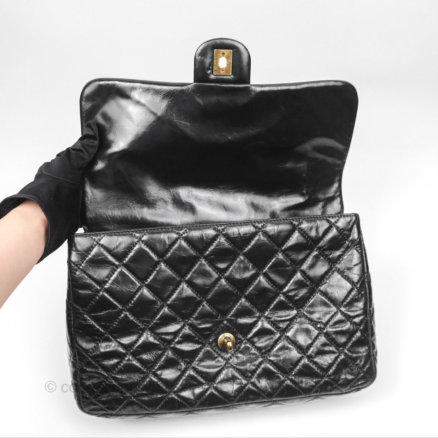 Chanel Medium Castle Rock Flap Black Glazed Calfskin Antique Gold Hardware