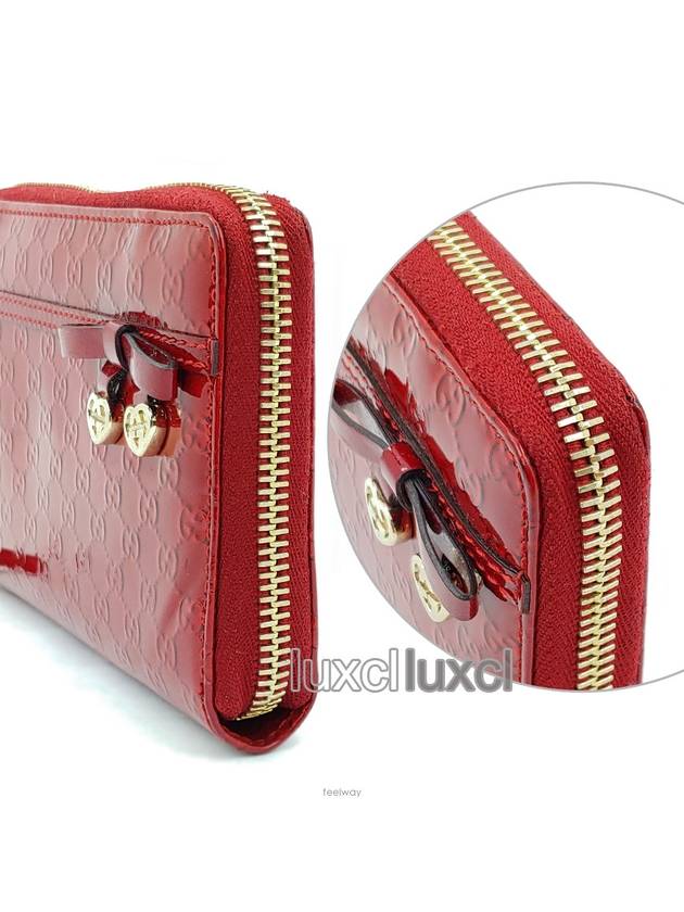 Luxury Gucci Trending 2025 GG patent ribbon heart zipper wallet 258407
