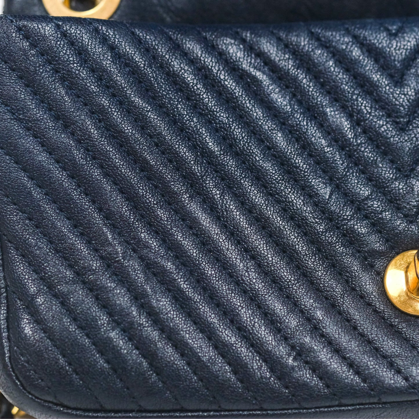 Chanel Small Chevron Surpique Flap Navy Calfskin Aged Gold Hardware