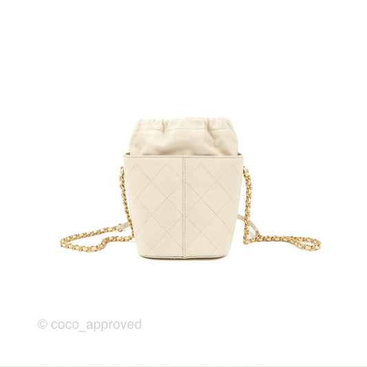 Chanel Quilted Drawstring Bucket Bag Ivory Lambskin Aged Gold Hardware 19C