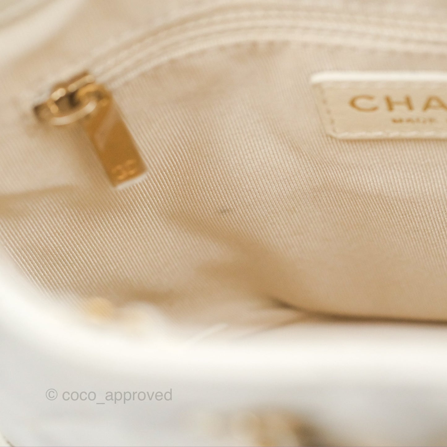 Chanel Quilted Drawstring Bucket Bag Ivory Lambskin Aged Gold Hardware