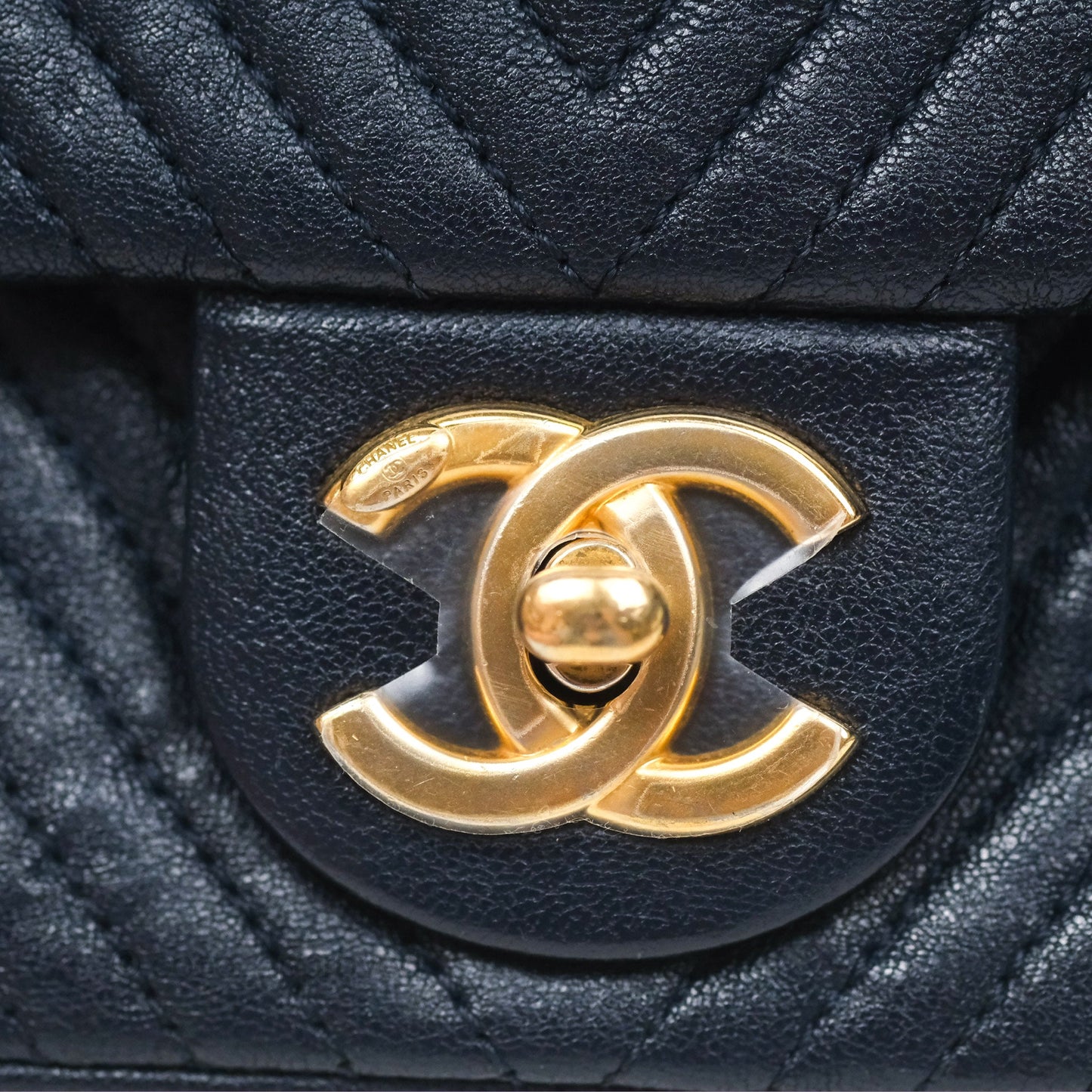 Chanel Small Chevron Surpique Flap Navy Calfskin Aged Gold Hardware