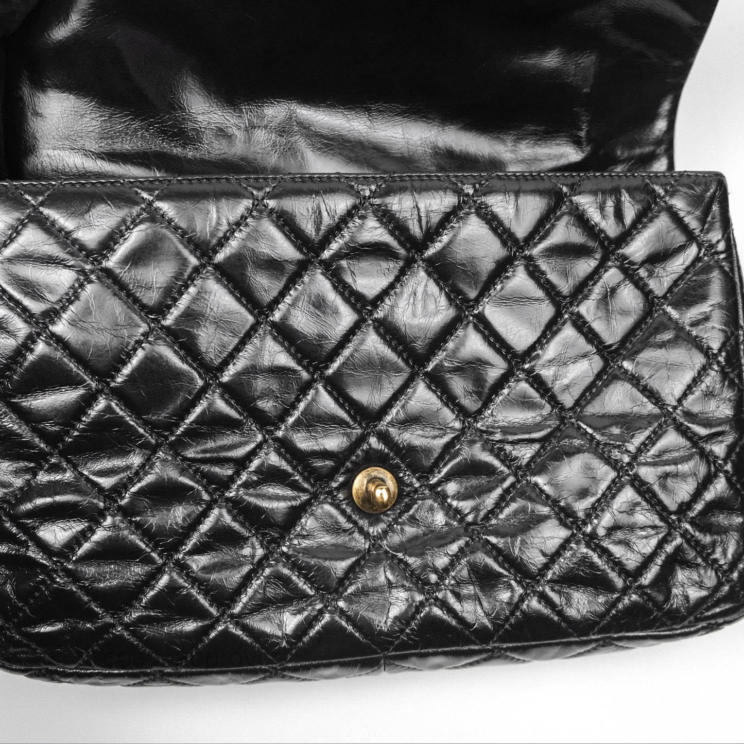 Chanel Medium Castle Rock Flap Black Glazed Calfskin Antique Gold Hardware