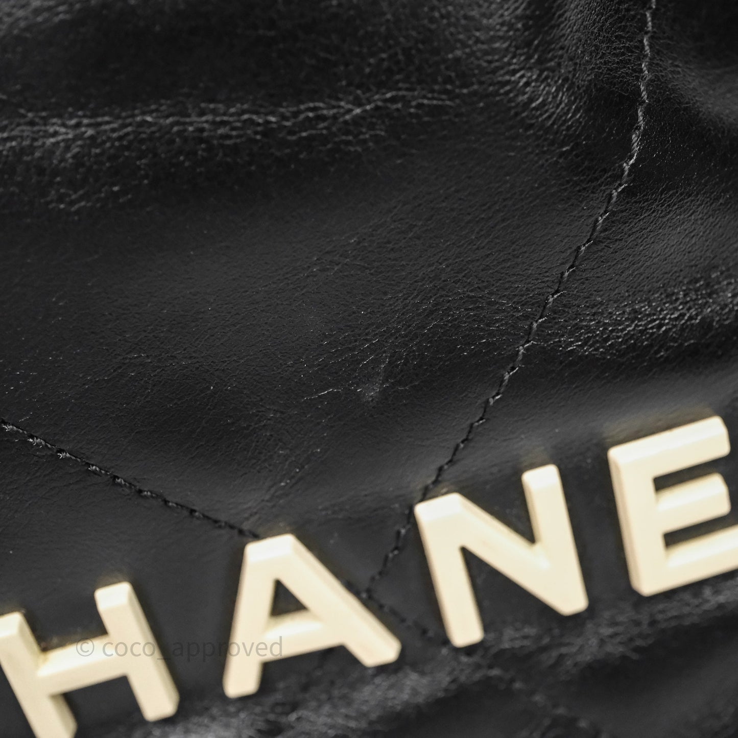 Chanel 22 Mini Bag Black Crumpled Calfskin White Lacquered Metal Logo