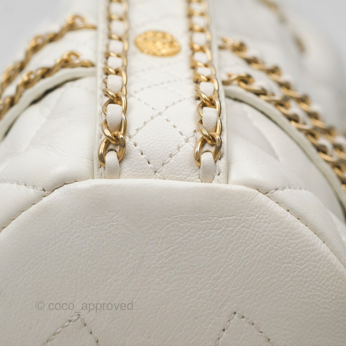 Chanel Quilted Drawstring Bucket Bag Ivory Lambskin Aged Gold Hardware