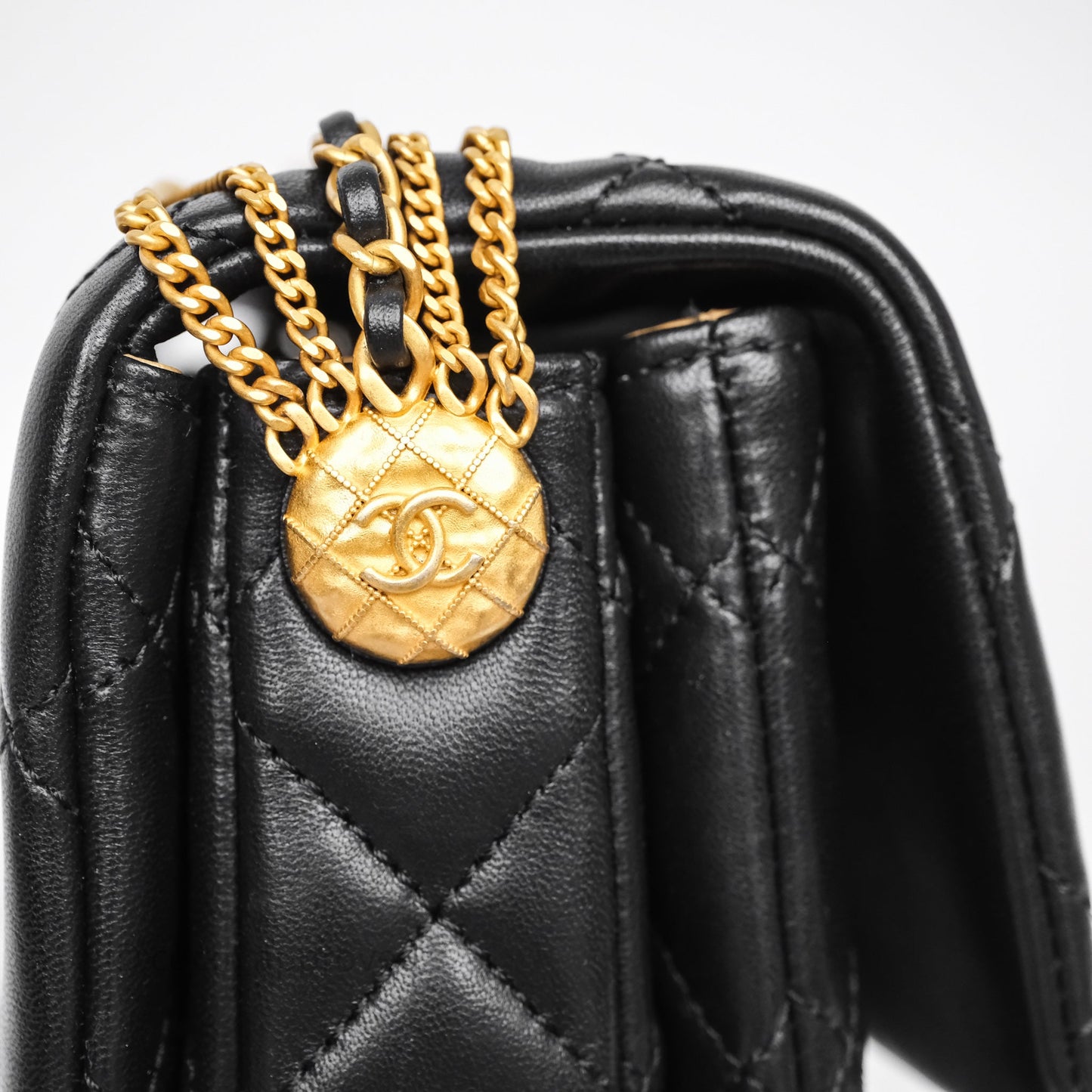 Chanel Quilted Accordion Flap Bag with Button on Chain Black Lambskin Aged Gold Hardware 22A