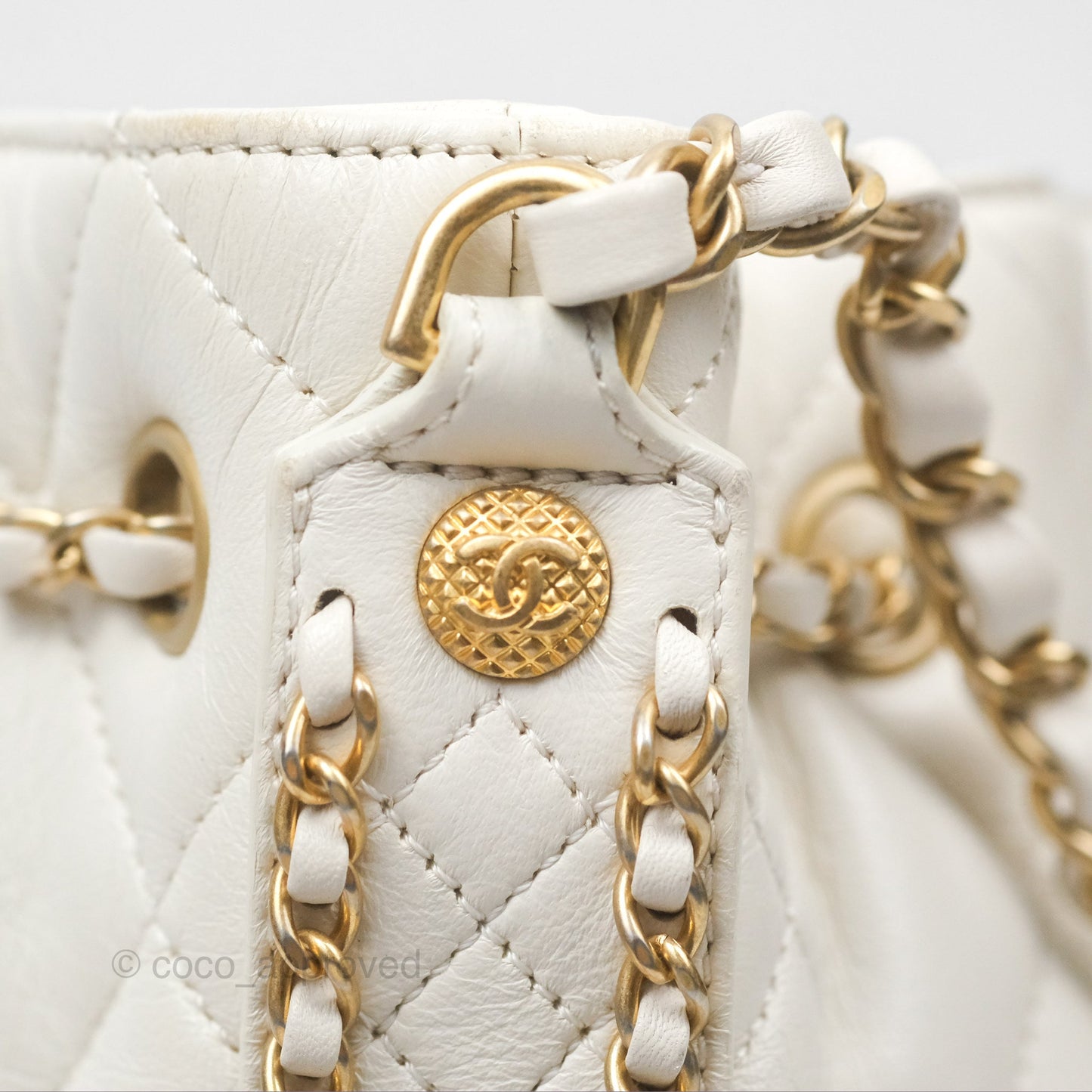 Chanel Quilted Drawstring Bucket Bag Ivory Lambskin Aged Gold Hardware