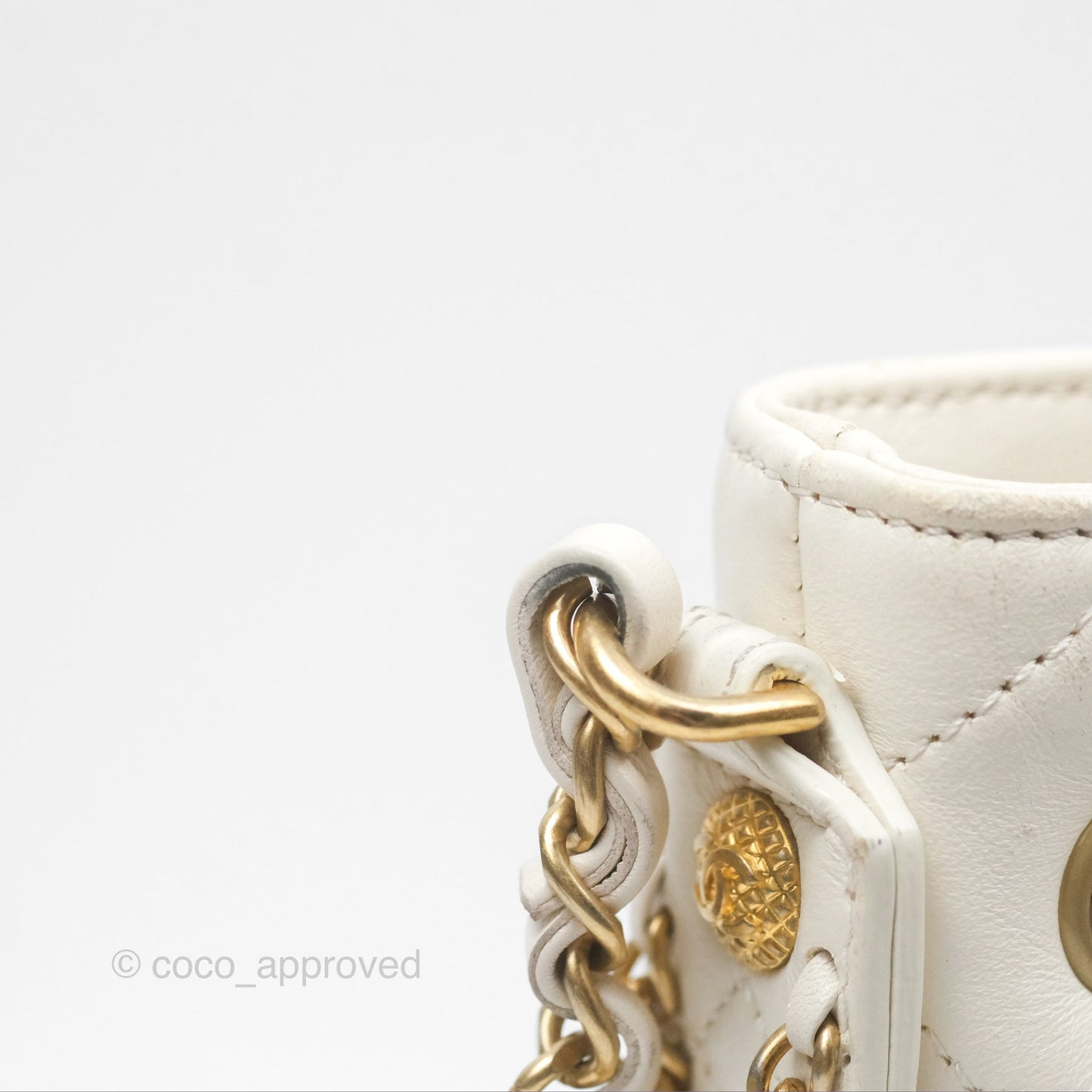 Chanel Quilted Drawstring Bucket Bag Ivory Lambskin Aged Gold Hardware