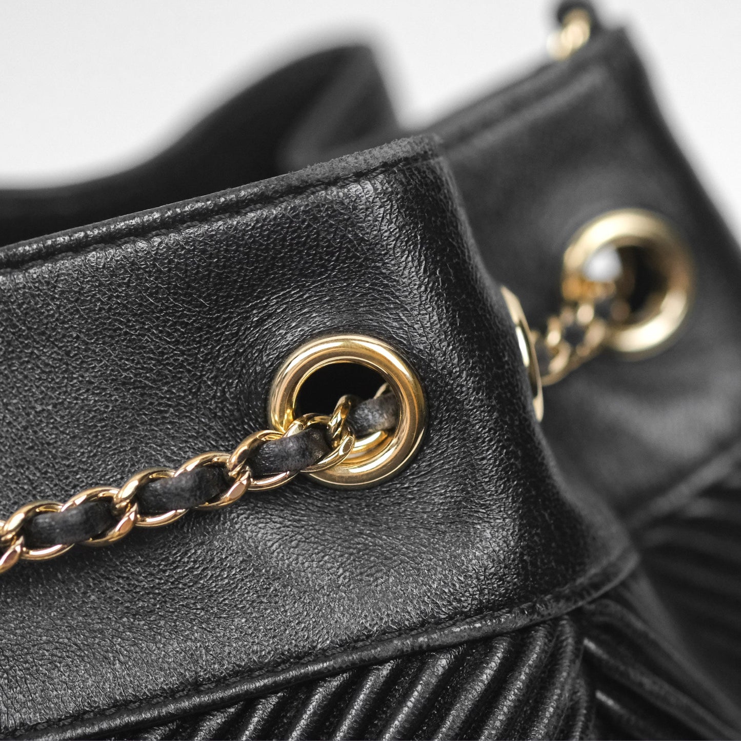 Chanel CC Chain Drawstring Bucket Bag Chevron Black Lambskin Gold Hardware