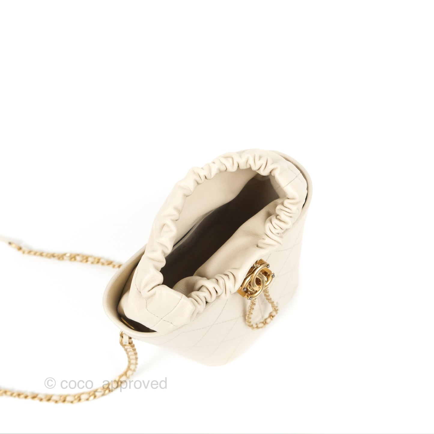 Chanel Quilted Drawstring Bucket Bag Ivory Lambskin Aged Gold Hardware 19C