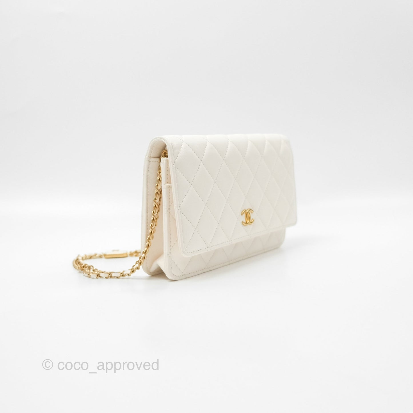 Chanel Quilted WOC White Lambskin Gold Hardware With Charms