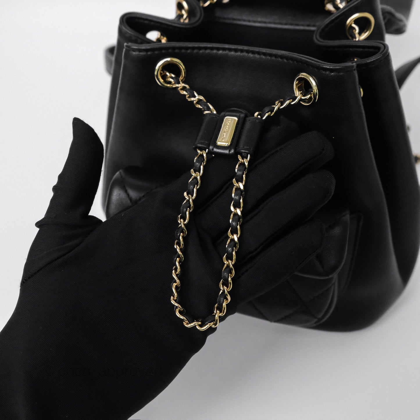 Chanel Small Duma Drawstring Backpack Black Lambskin Gold Hardware